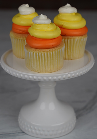 CC-061 Candy corn cupcake.  Chocolate with white mousse filling. CC-061 Candy corn cupcake.  Chocolate with white mousse filling.