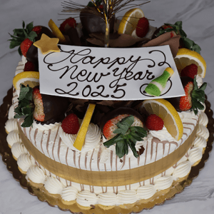 The NY-007 Raspberry Lemon cake is festively decorated with chocolate-covered strawberries, raspberries, lemon slices, and a gold ribbon, topped with a "Happy New Year 2025" sign and a champagne bottle illustration.