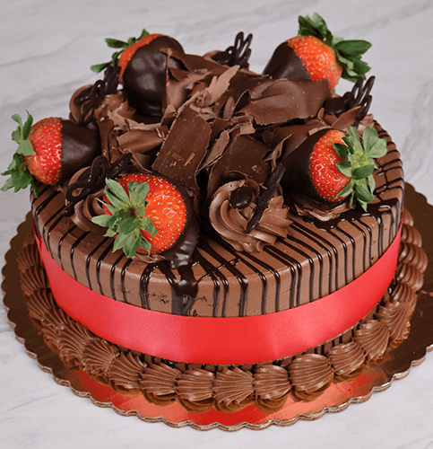 The BD-014B Chocolate/Chocolate cake features chocolate-dipped strawberries, chocolate shavings, and chocolate decorations, all finished with a red ribbon and presented on a gold cake board.