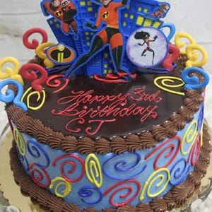 The SC-060 Incredibles cake features colorful decorations with The Incredibles characters, blue and red swirls, chocolate frosting, and an Elastigirl topper that says "Happy 3rd Birthday CJ" in red icing.