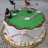 The SC-071 Baseball is a round cake decorated like a baseball field with white frosting, red piping, sprinkles, small baseball designs on the sides, and plastic player figurines on top.