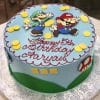 The CB-011T is a round blue birthday cake featuring Mario and Luigi, yellow coins, red "Happy 5th Birthday Aaryan" lettering, and Mario-themed designs on the sides.