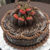 The BD-045 is a round chocolate cake with "Happy Birthday Ellen" in icing, topped with chocolate-covered strawberries and a chocolate "61" decoration, all presented on a foil-covered board.