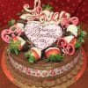 The VC-007 Display Tiramisu cake with Valentine's decor features chocolate-dipped strawberries, pink heart-shaped chocolates, a white chocolate "Happy Valentines Day" plaque, a Love topper, and a heart-patterned ribbon around the side.
