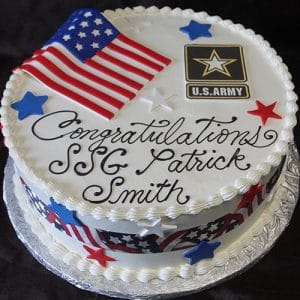 BD-111: Round cake featuring an American flag, U.S. Army logo, red, white, and blue stars, and “Congratulations SSG Patrick Smith” piped in black icing.