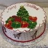 The CH-018 is a round Christmas cake topped with a green tree, colorful presents, and "Merry Christmas." Sides are decorated with reindeer and red polka dots, finished with a red bead border at the base.