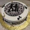 The BD-063 Disco theme/Music notes cake is round with a disco ball design on top, two dancer silhouettes, musical notes on the sides, "60th BIRTHDAY" in black letters, and set on a gold board.