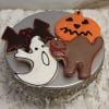 CE-080a Halloween features four festive cookies on a silver stand: a black bat, white ghost, gray cat with red outline, and orange jack-o’-lantern, each decorated with colorful icing.