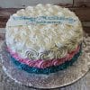 CB-018A is a round cake with white, pink, and blue swirled icing. A white plaque on top says “Happy 7th Birthday Arianna” in blue script. The cake is presented on a silver, textured board.