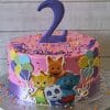 The CB-009Q is a pink birthday cake for a second birthday, decorated with colorful balloons, cartoon animals, rainbow sprinkles, and topped with a large purple number 2.