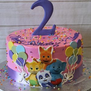 The CB-009Q is a pink birthday cake for a second birthday, decorated with colorful balloons, cartoon animals, rainbow sprinkles, and topped with a large purple number 2.