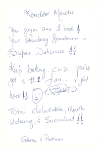 Handwritten customer note praising Konditor Meister’s strawberry grand marnier cake